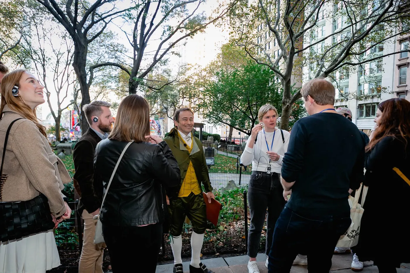 Tour group gathered in a lower Manhattan park